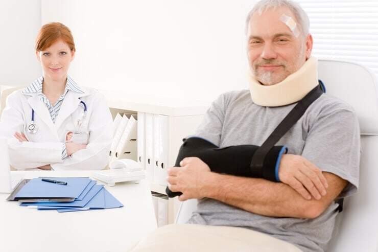 Senior patient broken arm in doctor office
